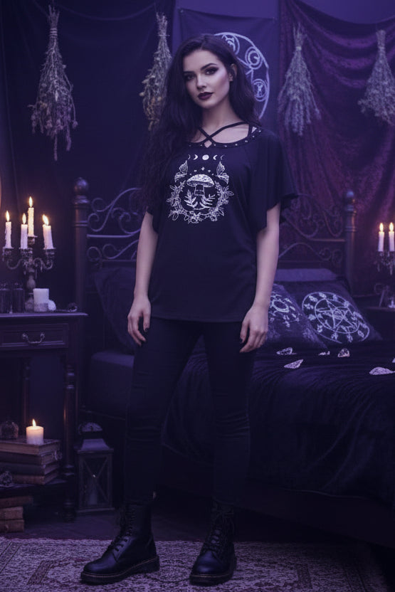 Black shirt with white graphic design on a white background